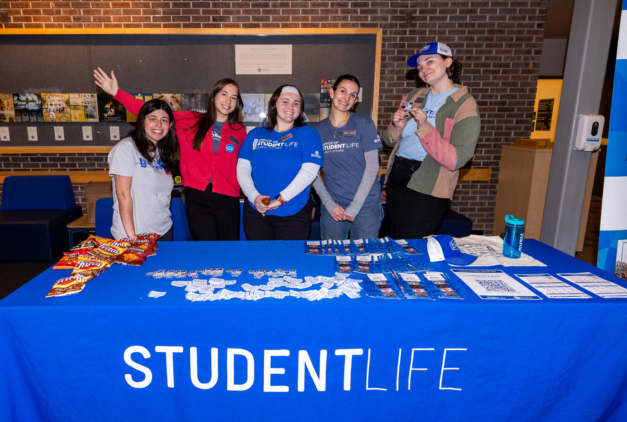 Students at student life table at Campus Life Night
